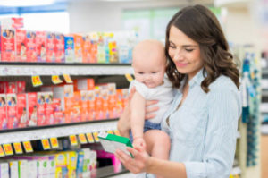 A woman shopping for baby products at pharmacy